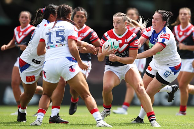 The Rooster's Brydie Parker takes on the defence during the round three NRLW match.