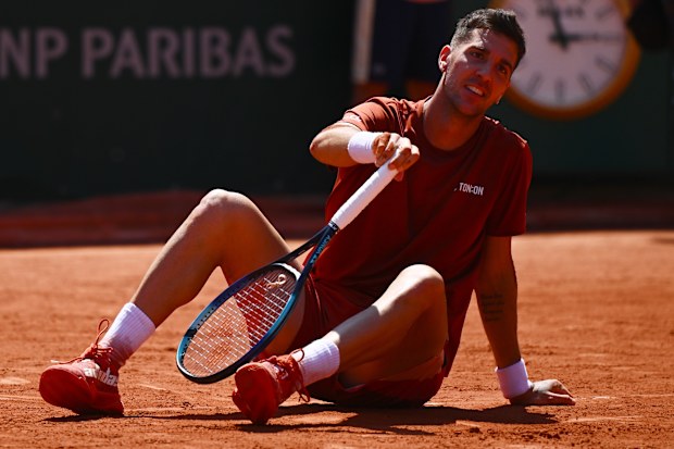 Thanasi Kokkinakis of Australia reacts after defeat against Karen Khachanov.