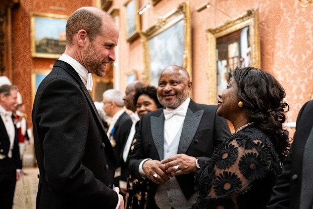 Prince William, Prince of Wales speaks to guests during the Diplomatic Corps reception at Buckingham Palace 
