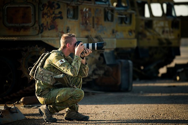 Jake loves his job as a photographer with the Australian Army