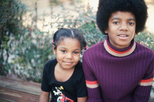 Michael Jackson and sister Janet pose for a photo at their Hollywood Hills home in 1972.