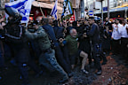 <p>Netanyahu, in a nationally televised speech before undergoing hernia surgery later on Sunday, said he understood families' pain. But he said calling new elections — in what he described as a moment before victory — would paralyse Israel for six to eight months and stall the hostage talks. For now, Netanyahu's governing coalition appears to remain firmly intact.</p><p>Some hostage families agree that now is not the time for elections.</p>