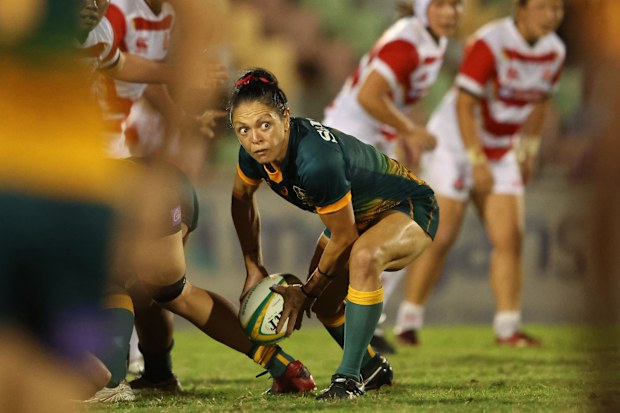 Iliseva Batibasaga of the Wallaroos passes during a Test between the Australia and Japan.
