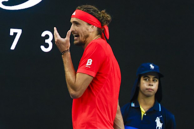 Alexander Zverev is frustrated when he can't find his freshly strung racquets in the first set.