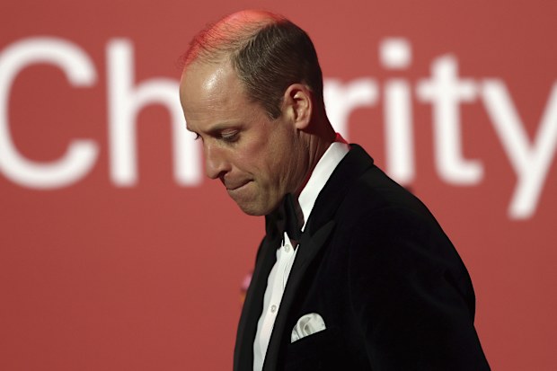 Britain's Prince William, the Prince of Wales leaves the stage after delivering a speech during the London Air Ambulance Charity Gala Dinner at The OWO, in central London, Wednesday, Feb. 7, 2024. 