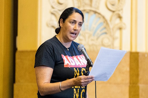 The Greens' Alex Bhathal addresses the audience during a Batman candidates forum at the Northcote Town Hall, in Melbourne, Australia, Tuesday, March 6, 2018. (AAP Image/Daniel Pockett)