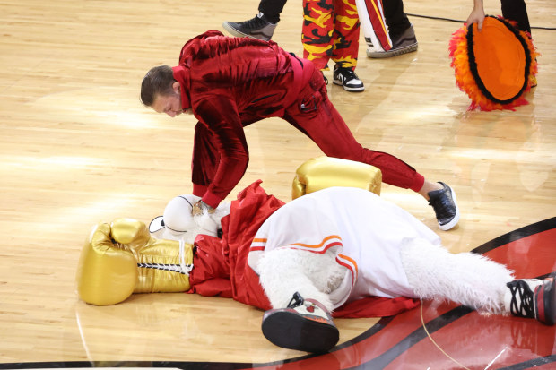 Connor McGregor and Mascot Burnie of the Miami Heat got into a tussle.
