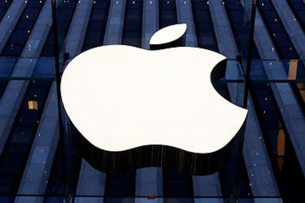 Apple logo at front of Fifth Avenue store (Mark Lennihan/AP)