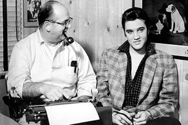 Colonel Tom Parker and Elvis Presley in 1956 (Getty)