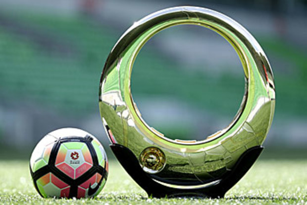 A-League football and championship trophy (Getty)