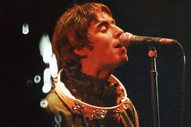 Liam Gallagher of Oasis performs at 1995 Glastonbury Festival (Pete Still/Getty)