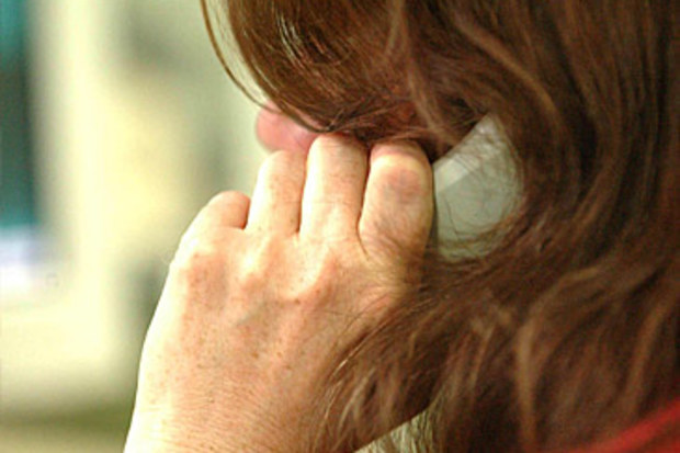 Lifeline counsellor on phone (Fairfax/Nine)
