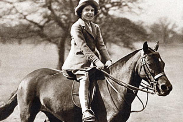 Elizabeth II as a child riding horse (Getty)