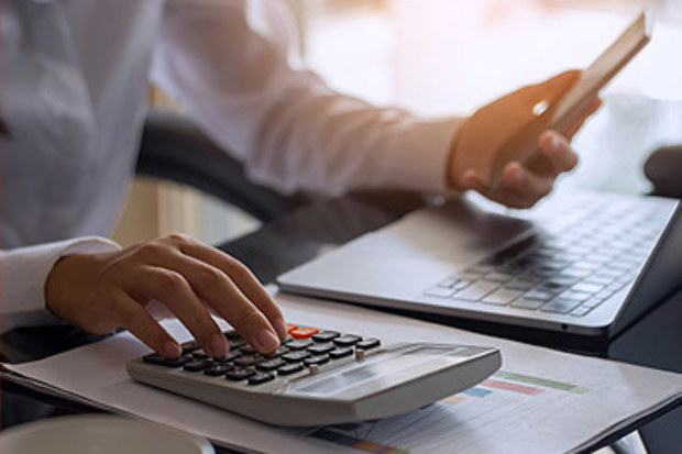 Stock image of woman in home office (Getty)