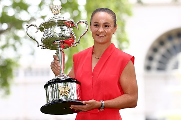Ash Barty poses with the Daphne Akhurst Memorial Cup after winning last nights 2022 Austrlian Open Women's Singles Final.
