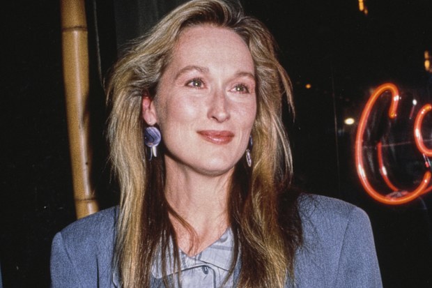 American actor Meryl Streep, wearing a blue blazer over a checked grey shirt, attends a press conference for 'A Cry in the Dark' in New York City, New York, 1988