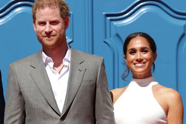 Prince Harry and Meghan, Duchess of Sussex arrive on the red carpet to be welcomed by the Mayor during the Invictus Games Dusseldorf 2023 - One Year To Go events on September 06, 2022 in Dusseldorf, Germany. (Photo by Mathis Wienand/Getty Images)