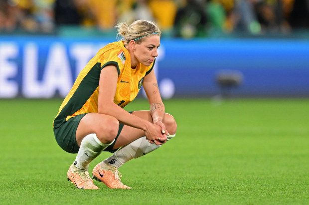 BRISBANE, AUSTRALIA - JULY 27: Alanna Kennedy of Australia shows dejection after her team's 2-3 defeat in the FIFA Women's World Cup Australia & New Zealand 2023 Group B match between Australia and Nigeria at Brisbane Stadium on July 27, 2023 in Brisbane, Australia. (Photo by Bradley Kanaris/Getty Images)