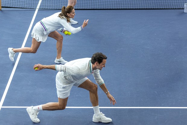 LONDON, ENGLAND - JUNE 24:  In this handout images released by Kensington Palace on June 24, 2023, Catherine, Princess of Wales and Wimbledon Champion Roger Federer join a ball boy and girl practice in the run up to The Championships 2023. In the AELTC Indoor Tennis Courts at The All England Lawn Tennis Club, Wimbledon, on June 8, 2023 in London, England. (Photo by Handout/Thomas Lovelock - AELTC via Getty Images)