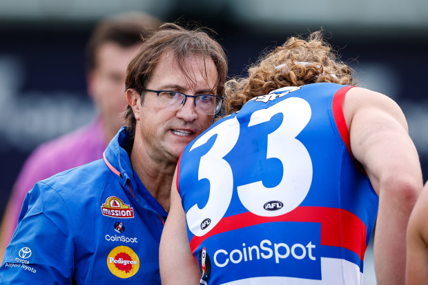 BALLARAT, AUSTRALIA - JULY 29: Luke Beveridge, Senior Coach of the Bulldogs speaks with Aaron Naughton of the Bulldogs during the 2023 AFL Round 20 match between the Western Bulldogs and the GWS GIANTS at Mars Stadium on July 29, 2023 in Ballarat, Australia. (Photo by Dylan Burns/AFL Photos via Getty Images)