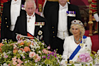 LONDON, ENGLAND - JUNE 25: King Charles III delivers a speech as Queen Camilla and Emperor Naruhito of Japan (L) listen during the State Banquet for Emperor Naruhito and his wife Empress Masako of Japan at Buckingham Palace on June 25, 2024 in London, England. The Japanese royal couple arrived in Britain for a three-day state visit hosted by King Charles III. (Photo by Jordan Pettitt - WPA Pool/Getty Images)