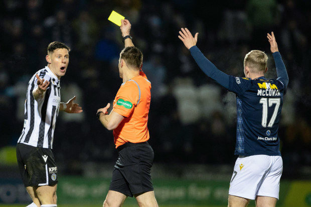 St Mirren's James Bolton is shown a yellow card during a cinch Premiership match between St Mirren and Dundee.