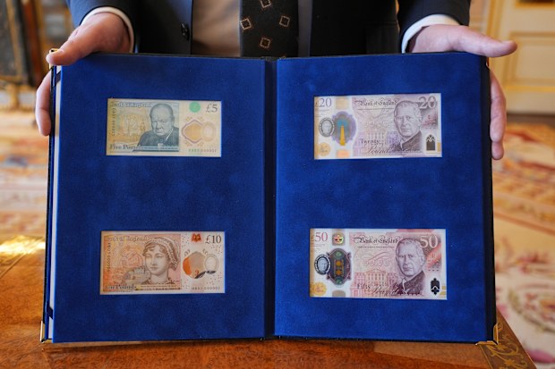 view of some of the new bank notes bearing a portrait of King Charles III