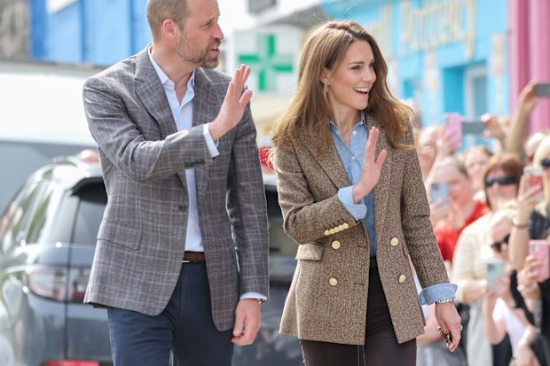 TOBERMORY, SCOTLAND - APRIL 29: Prince William, Prince of Wales, known as the Duke of Rothesay and Catherine, Princess of Wales, known as the Duchess of Rothesay when in Scotland, smile and wave to well-wishers as they arrive for a visit to Aros Hall, a local community hub on April 29, 2025 in Tobermory, Scotland. The Prince and Princess of Wales are on a two-day visit to the Isles of Mull and Iona on the 29th and 30th of April to engage with rural island communities. During their time on the is