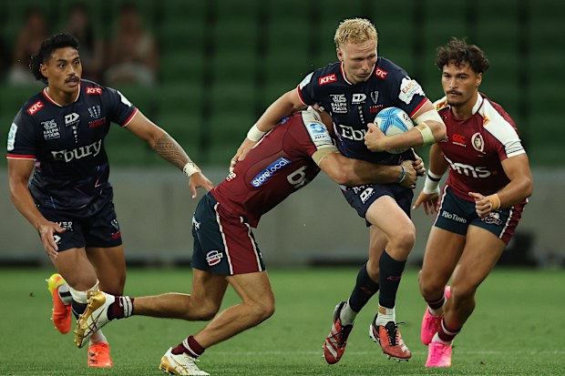 Carter Gordon of the Rebels runs with the ball during the round four Super Rugby Pacific match against the Melbourne Rebels.