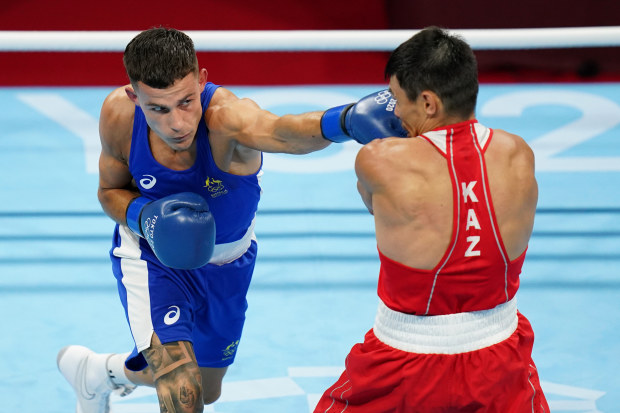 Australia's Harry Garside (left) and Kazakhstan's Zakir Safiullin battle.