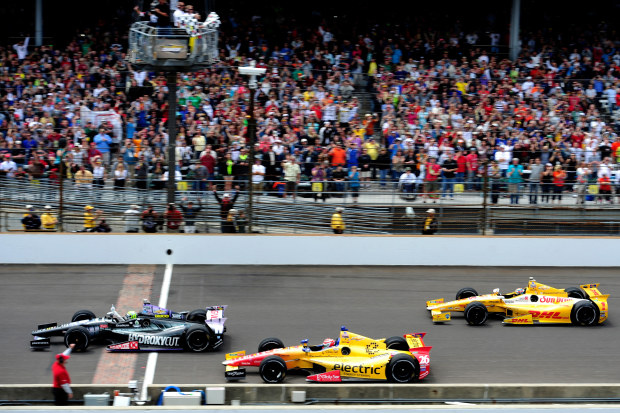 The finish of the 2013 Indianapolis 500, won by Tony Kanaan with Carlos Munoz and Ryan Hunter-Reay in tow. 