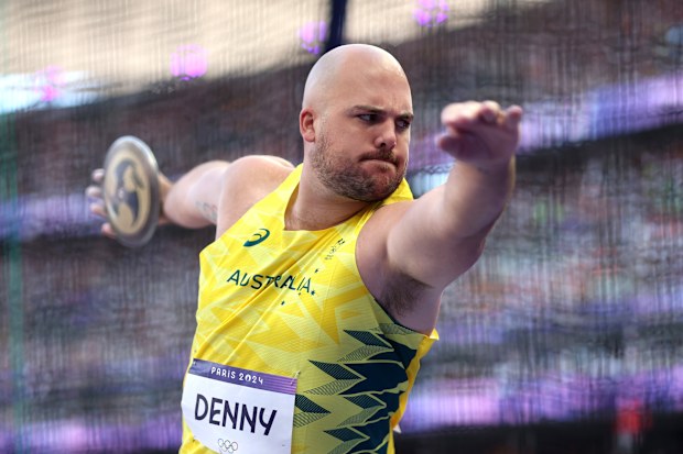 Matthew Denny of Team Australia competes during the Men's Discus Throw Qualification on day ten of the Olympic Games Paris 2024 at Stade de France on August 05, 2024 in Paris, France. (Photo by Patrick Smith/Getty Images)