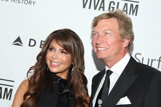 LOS ANGELES, CA - DECEMBER 12:  TV personalities Paula Abdul (L) and Nigel Lythgoe attend the 2013 amfAR Inspiration Gala Los Angeles at Milk Studios on December 12, 2013 in Los Angeles, California.  (Photo by Mike Windle/Getty Images )