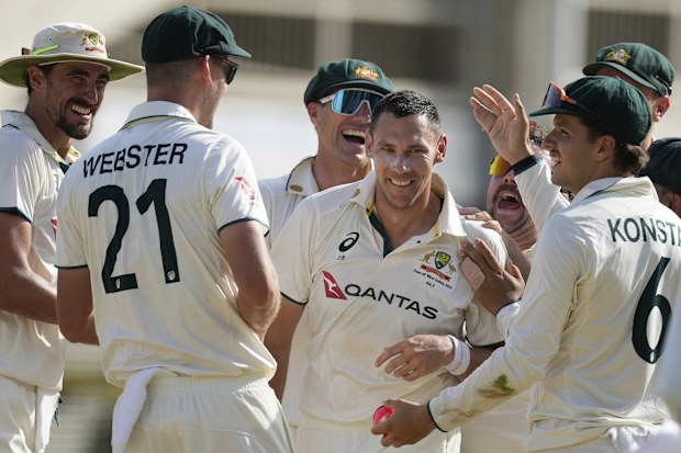 Scott Boland celebrates his hat-trick.
