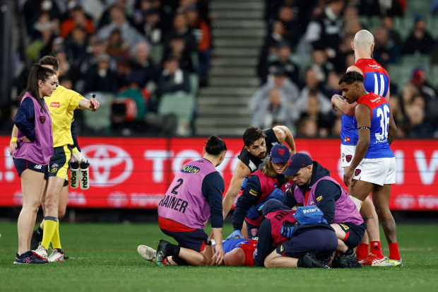 MELBOURNE, AUSTRALIA - SEPTEMBER 07: Angus Brayshaw of the Demons is seen injured during the 2023 AFL First Qualifying Final match between the Collingwood Magpies and the Melbourne Demons at Melbourne Cricket Ground on September 07, 2023 in Melbourne, Australia. (Photo by Michael Willson/AFL Photos via Getty Images)