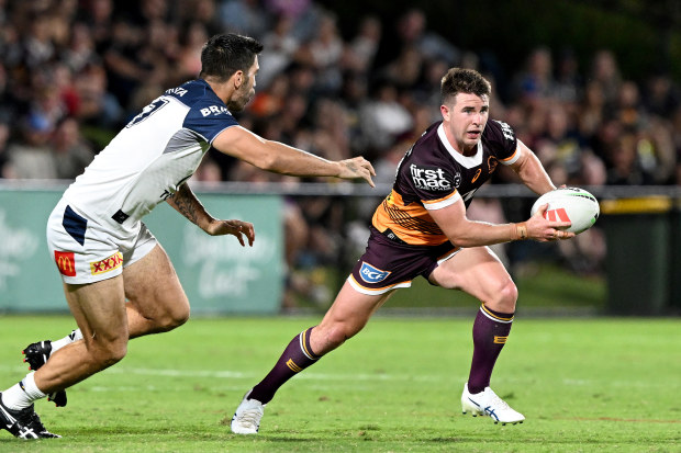 SUNSHINE COAST, AUSTRALIA - FEBRUARY 18: Jock Madden of the Broncos breaks away from the defence during the NRL Trial Match between the Brisbane Broncos and the North Queensland Cowboys at Sunshine Coast Stadium on February 18, 2023 in Sunshine Coast, Australia. (Photo by Bradley Kanaris/Getty Images)