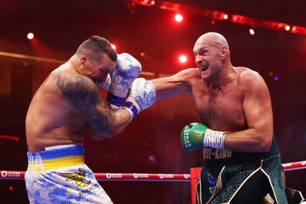 Tyson Fury punches Oleksandr Usyk during the IBF, WBA, WBC, WBO and Undisputed Heavyweight titles' fight between Tyson Fury and Oleksandr Usyk at Kingdom Arena on May 18, 2024 in Riyadh, Saudi Arabia. (Photo by Richard Pelham/Getty Images)