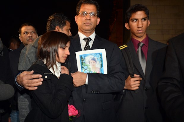 Benedict Barboza arrives at the Houses of Parliament in centrasl London with daughter Lisha, 14, and son Junal, 16, for a meeting with Keith Vaz MP following the death of Jacintha Saldanha.   (Photo by Anthony Devlin/PA Images via Getty Images)