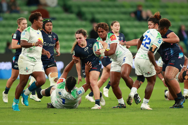 Jayme Nuku of the Rebels runs with the ball during the round five Super Rugby Women's match between Melbourne Rebels and Fijian Drua.