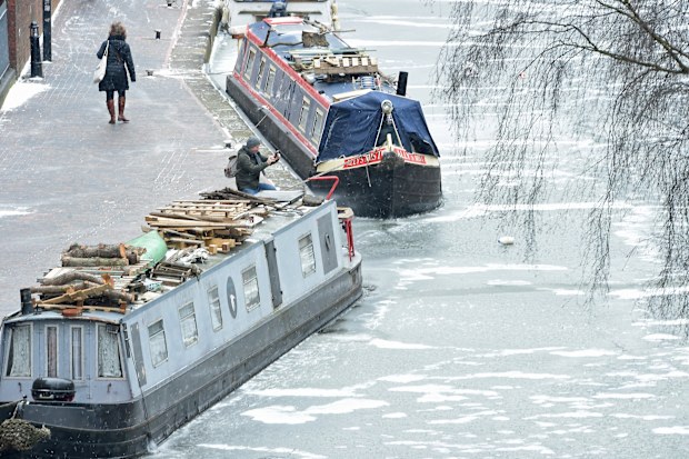 No go! Barges on a canal in Birmingham are frozen in. Picture: AAP