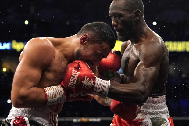 Terence Crawford (right) and David Avanesyan trade punches during their welterweight title fight at CHI Health Center in Omaha, Nebraska. (Photo by Ed Zurga/Getty Images)