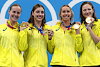 From left: Bronte Campbell, Meg Harris, Emma McKeon and Cate Campbell pictured after winning gold in the women's 4x100m freestyle relay at the Tokyo 2021 Olympics.