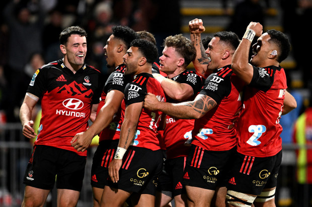 The Crusaders celebrate a try scored by Leicester Fainga'anuku during the Super Rugby Pacific Semi Final match against the Blues.