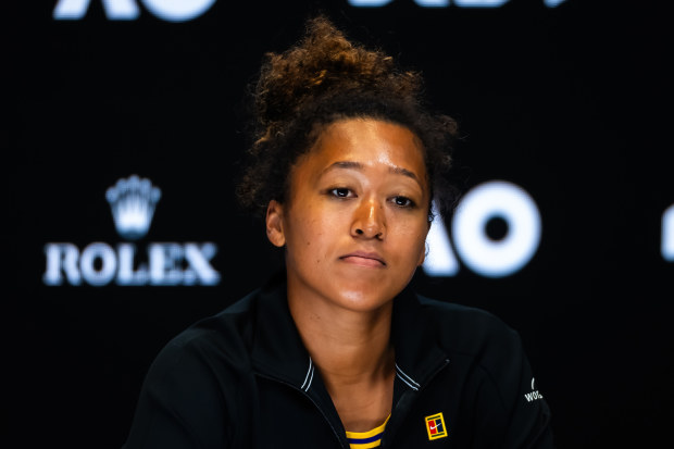 Naomi Osaka of Japan talks to the press at Melbourne Park.