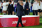 England coach Eddie Jones takes off his medal after defeat in the 2019 Rugby World Cup final.