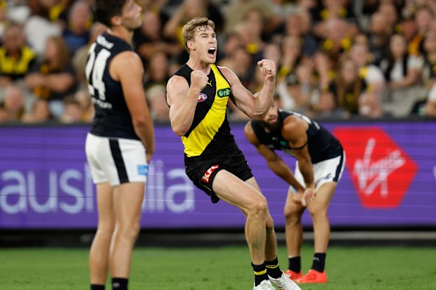 MELBOURNE, AUSTRALIA - MARCH 16: Tom Lynch of the Tigers celebrates a goal during the 2023 AFL Round 01 match between the Richmond Tigers and the Carlton Blues at the Melbourne Cricket Ground on March 16, 2023 in Melbourne, Australia. (Photo by Michael Willson/AFL Photos)