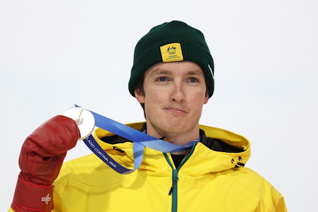 LIVIGNO, ITALY - FEBRUARY 13: Silver medalist Scotty James of Team Australia poses for a photo during the medal ceremony for the Men's Snowboard Halfpipe on day seven of the Milano Cortina 2026 Winter Olympic games at Livigno Snow Park on February 13, 2026 in Livigno, Italy. (Photo by Patrick Smith/Getty Images)