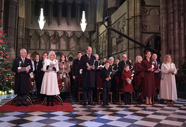 LONDON, ENGLAND - DECEMBER 15: (Front row left to right) King Charles III, Camilla, Queen Consort, Prince William, Prince of Wales, Prince George, Princess Charlotte, Catherine, Princess of Wales and Sophie, Countess of Wessex during the 'Together at Christmas' Carol Service at Westminster Abbey on December 15, 2022 in London, England. 