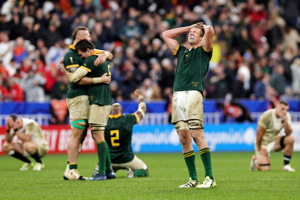 Pieter-Steph Du Toit (right) celebrates following South Africa's victory during the Rugby World Cup against England. 