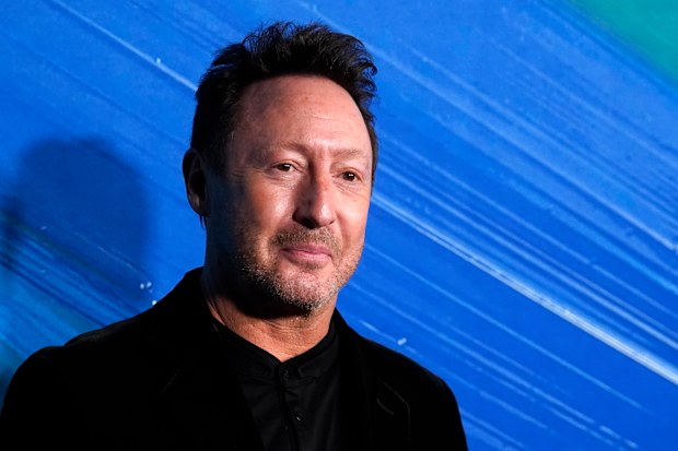Singer Julian Lennon poses at the amfAR Gala.